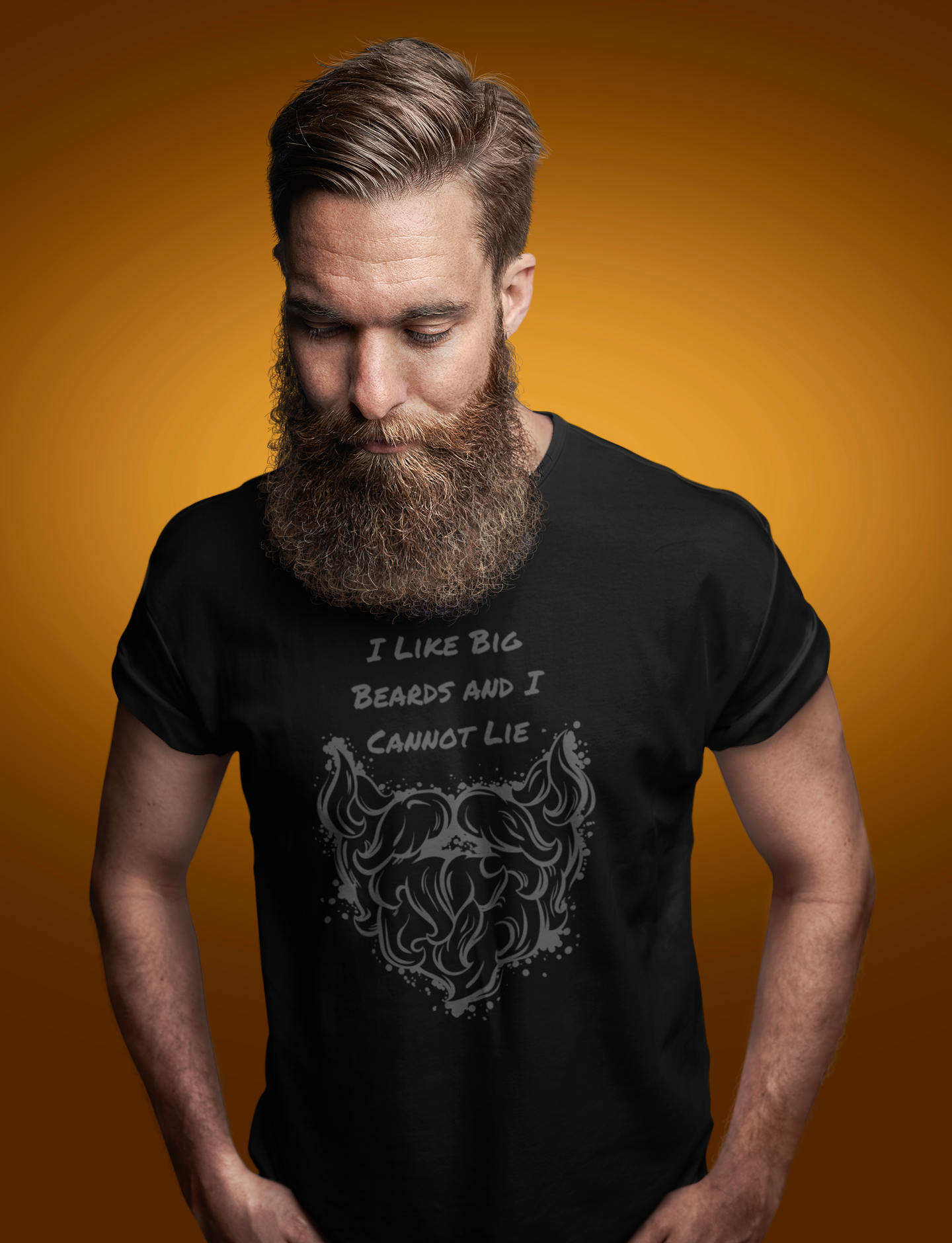 Handsome bearded man wearing a black t-shirt that has a thick beard on it and says 'I like big beards and I cannot lie'